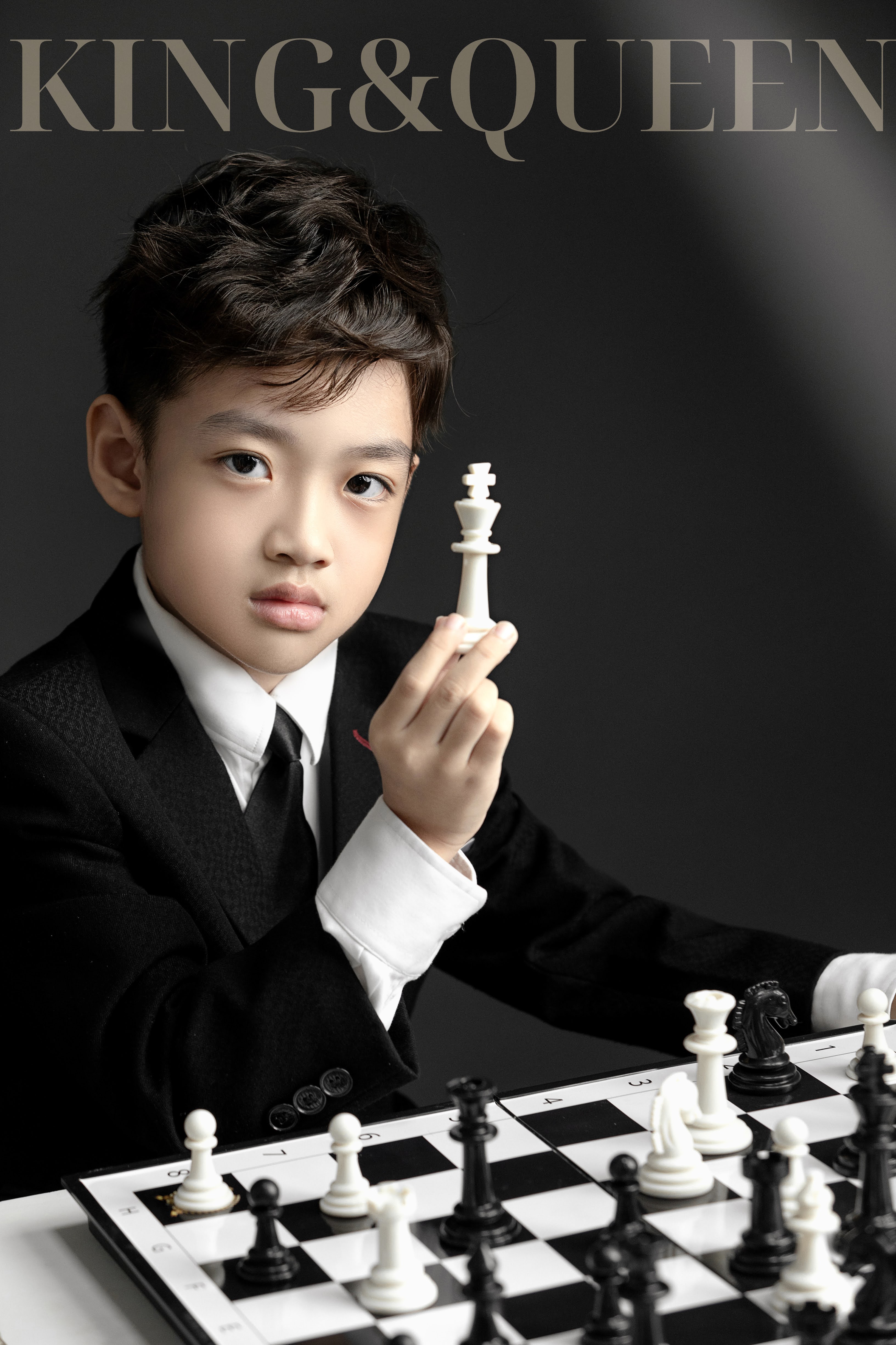 Chụp ảnh bé trai concept King Queen cờ vua suit đen lịch lãm tại Teddy Studio
